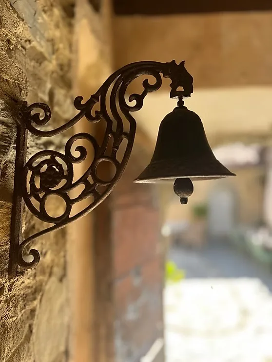 The wrought-iron bell